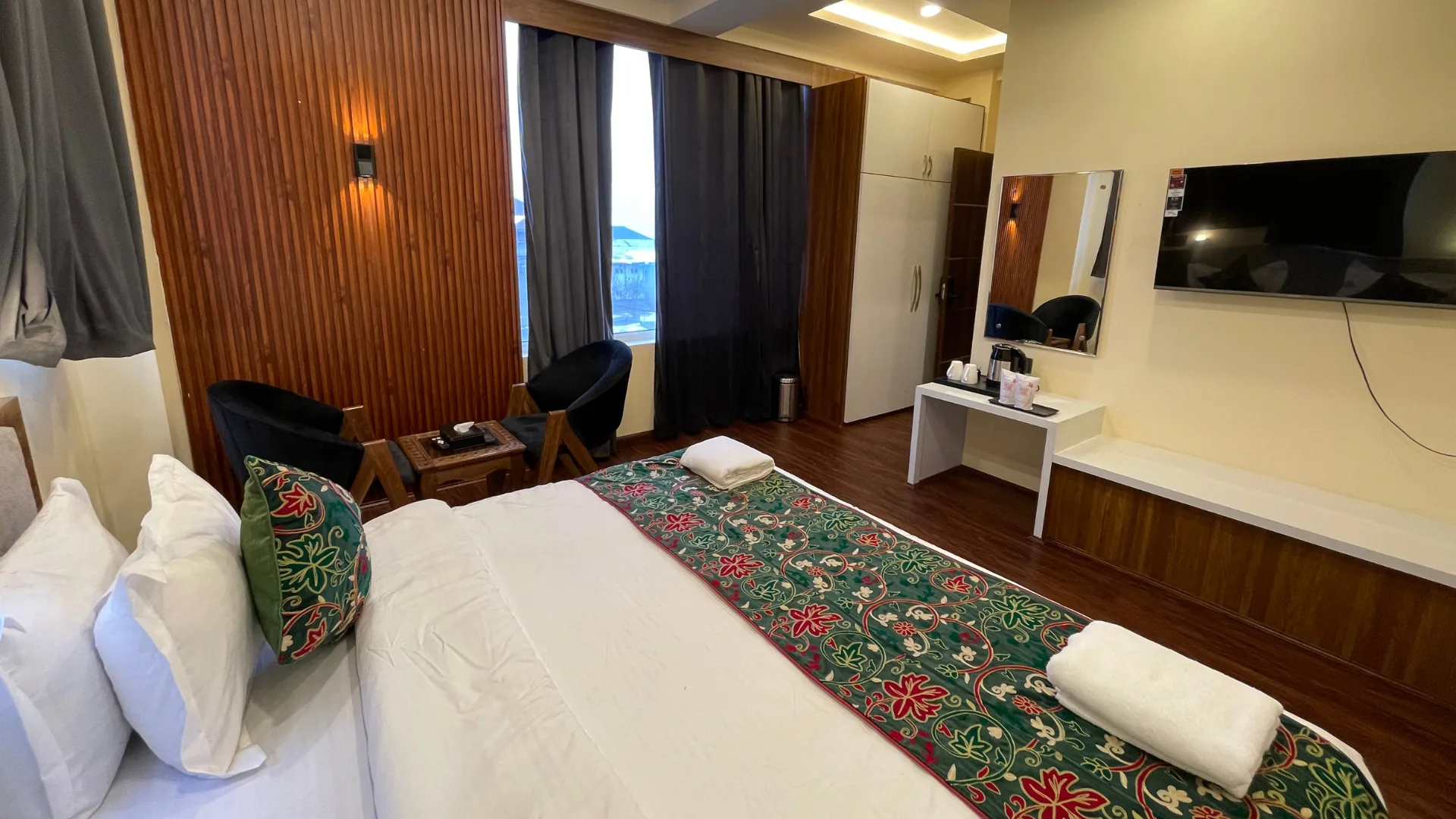 Suite bedroom setup with Kashmiri decor at Lake Loft